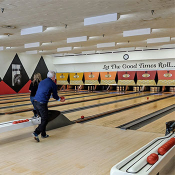 The home office had a blast at their Super Bowl(ing) party