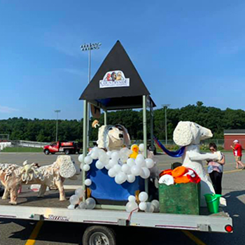 Countryside Veterinary Hospital's Fourth of July float