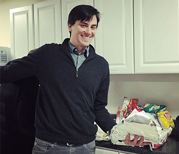 Peter hands out Philly cheesesteaks in honor of the Super Bowl win.