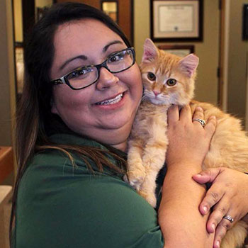 Maritza with a feline friend