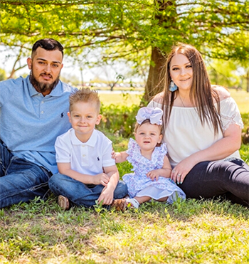 Veterinary technician, Tatum Howe, with her husband and their children